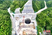 中国首座超大岩塞式混合抽蓄最大椭圆竖井半地下厂房交付